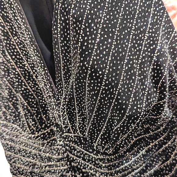 Black halter dress. - Picture 3 of 4